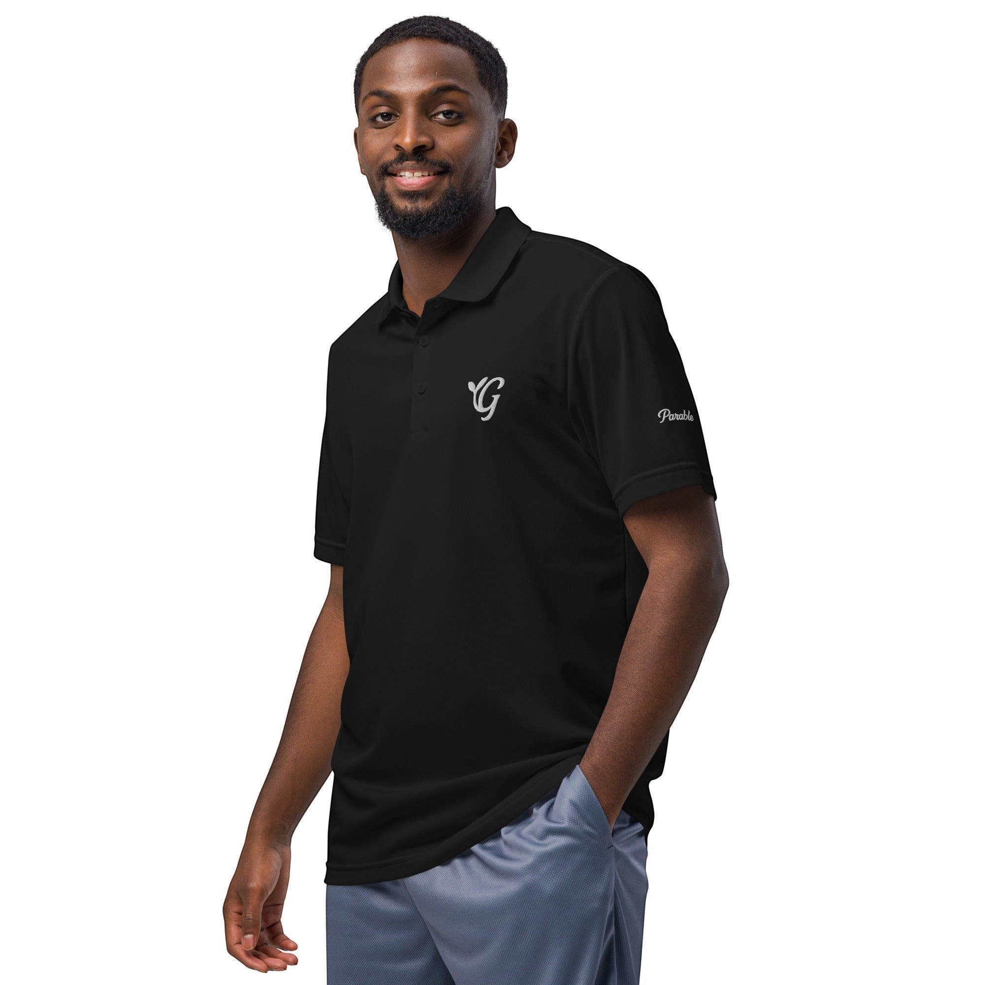 Parable Golf black 100% recycled polyester piqué polo shirt with hydrophilic finish and embroidered logo.