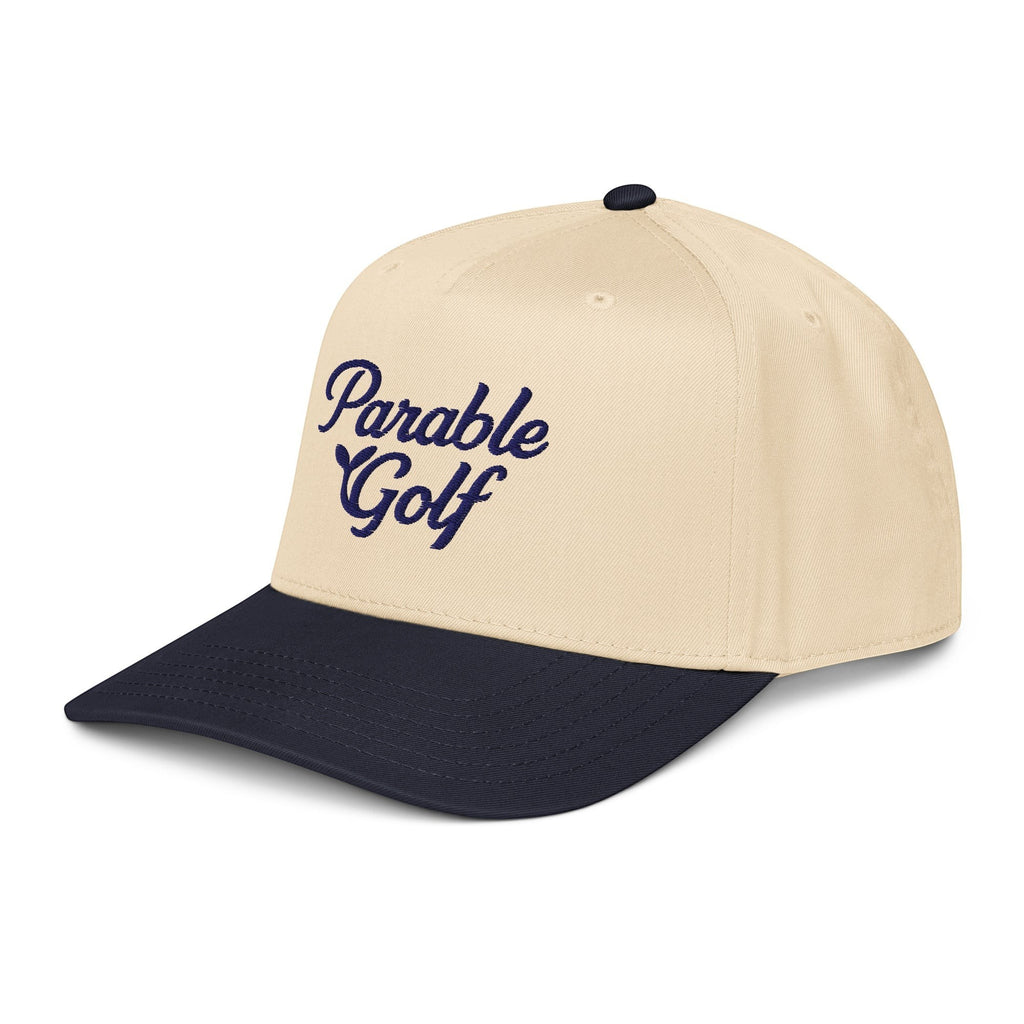 Parable Golf Heritage Hat in navy and natural with embroidered script logo. 65% polyester, 35% cotton.